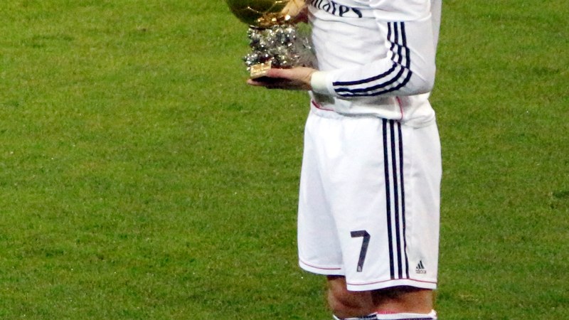 Cristiano Ronaldo holding the Ballon d'Or trophy