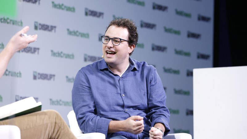 Dario Amodei speaking at TechCrunch Disrupt 2023