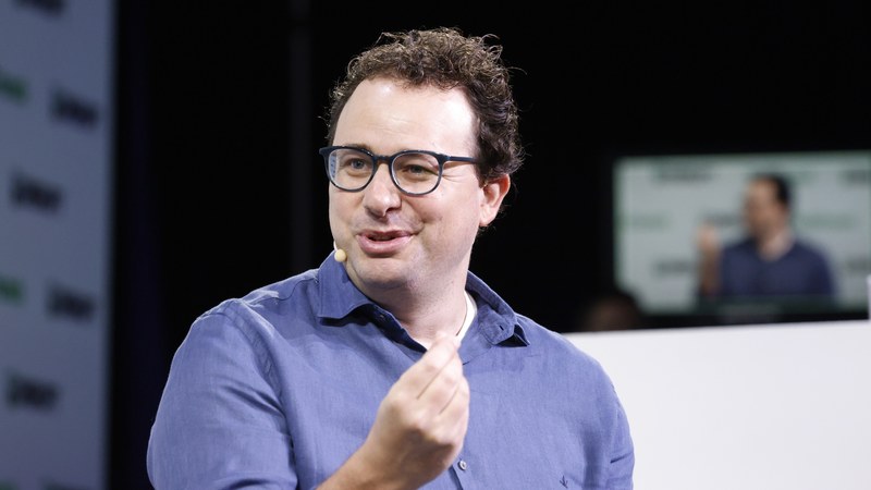 Dario Amodei speaking at TechCrunch Disrupt 2023
