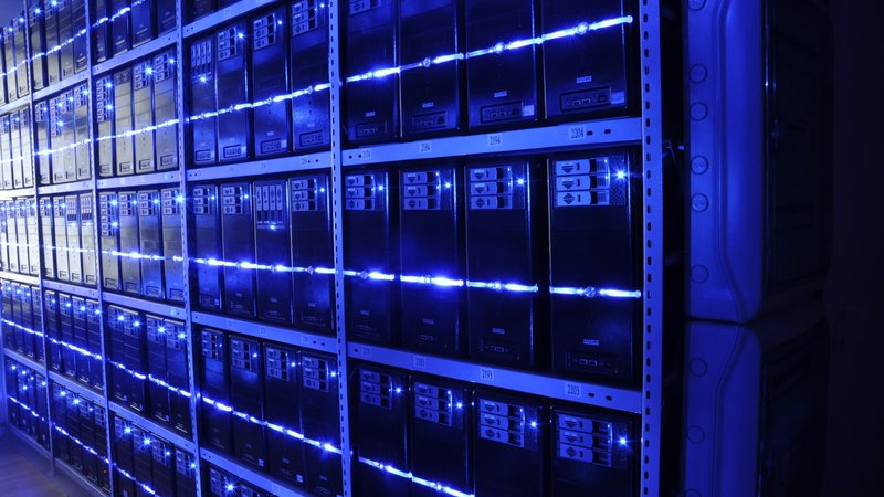 Modern data center server racks — Surge AI's business is the human layer behind AI infrastructure