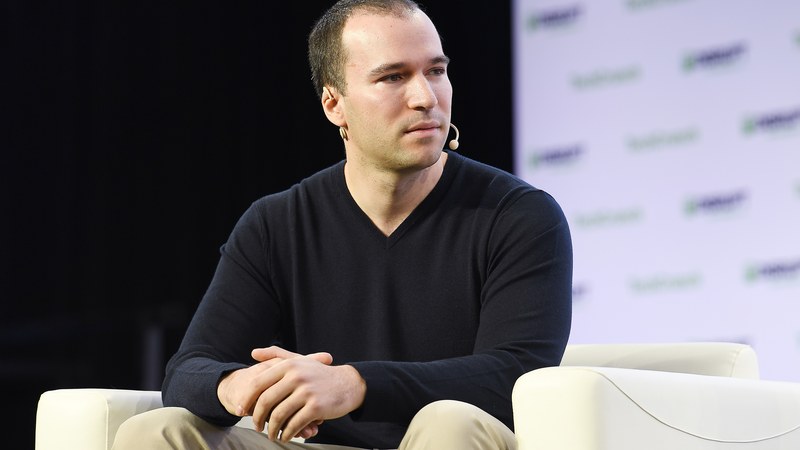 Greg Brockman on stage during a 2019 technology conference appearance