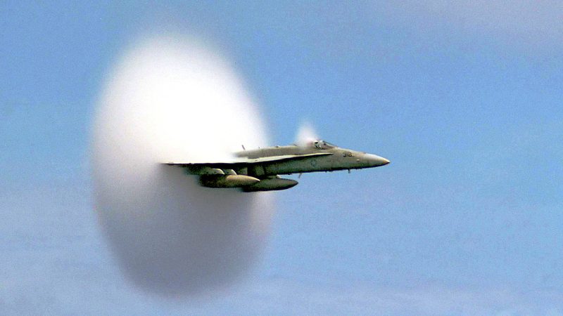 An F/A-18 Hornet fighter jet in flight