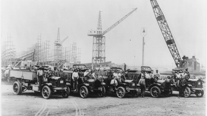 Vintage fleet of heavy-duty trucks in an archive photograph