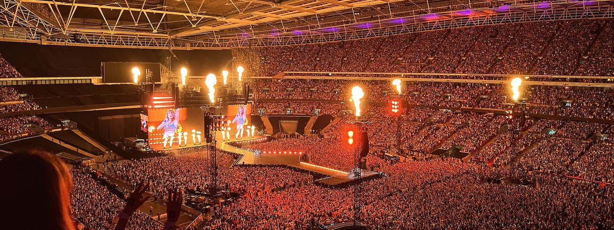 Taylor Swift performing on stage during the Eras Tour in London