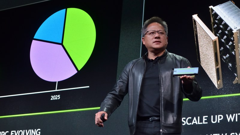 Jensen Huang speaking at a technology conference — his Nvidia pay is a fraction of his stock wealth