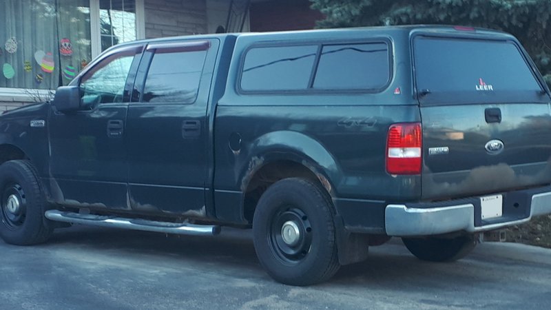 Ford F-150 pickup with a LEER camper shell