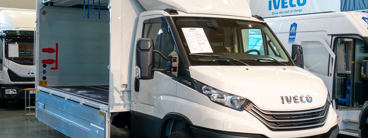 Commercial trucks on display at a trade fair