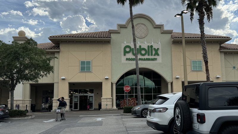 Grocery store exterior with parking lot