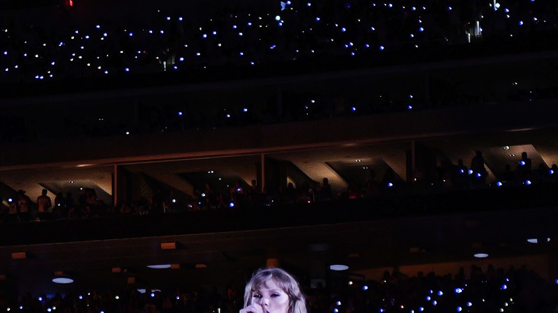 Taylor Swift performing on stage during the Eras Tour
