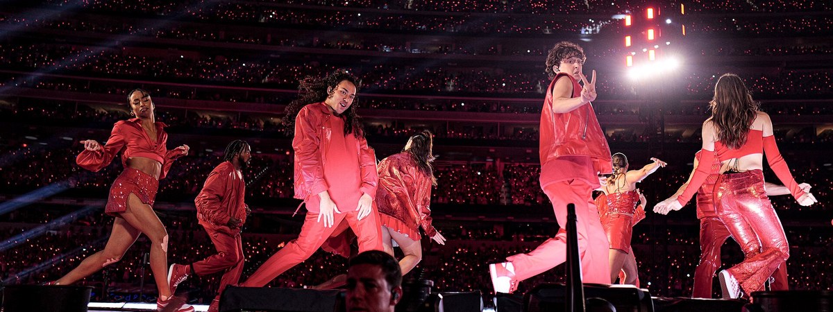 Taylor Swift performing on the Eras Tour Red era stage