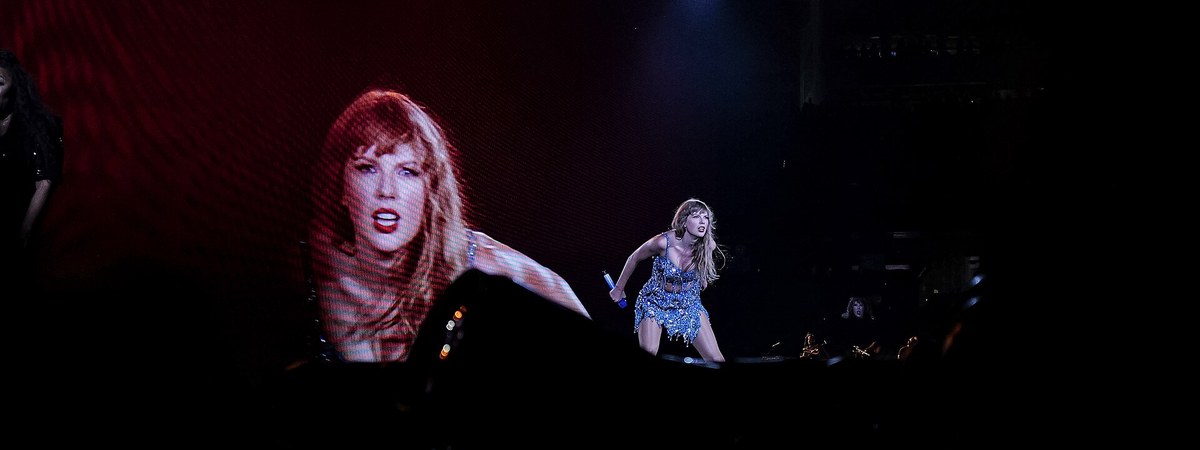 Taylor Swift performing on the Eras Tour stage