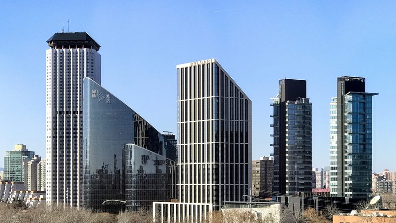 Modern corporate office building in Beijing, illustrating ByteDance's top-of-market pay philosophy